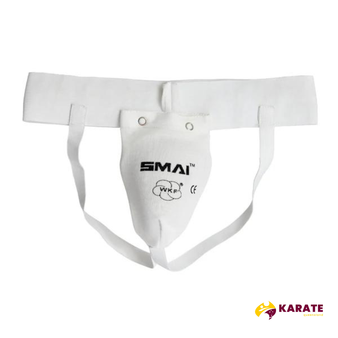 Close-up view of a white SMAI Karate Groin Guard with mesh cup holder and certification logos