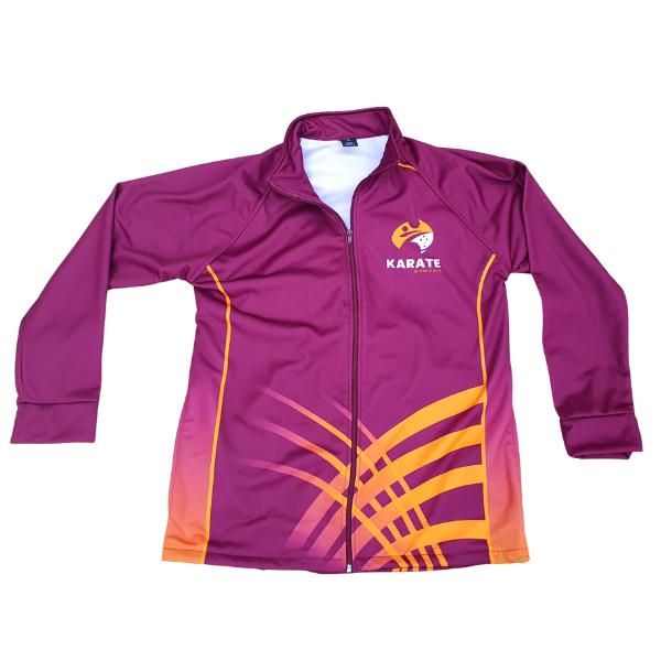 The official Karate Queensland tracksuit top shown from the front, worn zipped up. The design features a bold maroon base with dynamic gold detailing across the lower half and sides, and the Karate Queensland logo prominently displayed on the chest.